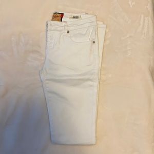 Beautiful white skinny jeans by Dear John